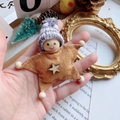 Star-shaped brown felt doll ornament with a wooden face and knitted hat hanging decor - Brown Felt Wood Star Smiling Star Man (42)