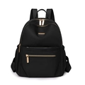 Zaino minimalista in nylon nero con cerniere dorate e grande capacità da viaggio - Nero