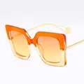 Fashionable large square sunglasses featuring orange gradient lenses and transparent frames - Orange and Champagne Frame Orange Yellow Lenses