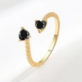 Adjustable gold plated open ring featuring double black heart shaped stones and beaded texture - December (Black)