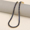 Elegant 18K gold plated necklace featuring round-cut deep blue sparkling crystals - Gold-Blue / Necklace