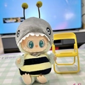 Labubu plush doll wearing a grey shark hood and black yellow bee striped outfit with chair - Sandbee Baby / First And Second Generation Keychains Are Compatible With La Cloth Dolls. Dolls Not Included.