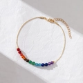 Pulsera de piedras arcoíris bañada en oro de 14K con cierre de langosta en cuero blanco - Pulsera / Dorado