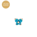 Detailed macro view of a butterfly earring in 14K solid gold with blue gemstones - December Deep Sea Blue