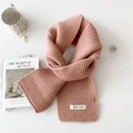 Pink chunky knit scarf with minimalist white label and classic woven texture - Pink