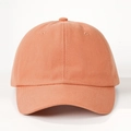 Detail view of orange cotton baseball cap showing six-panel stitching and breathable eyelets - One Size / Orange