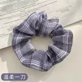 Chic purple and white checkered floral oversized scrunchie for elegant high pony hair styling - JK Gentle Cut