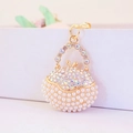 Portachiavi creativo mini borsa con perle bianche e cristalli brillanti incastonati - Colorato