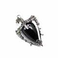 Close-up of teardrop labradorite stone set in silver filigree star and vine pendant - Obsidian
