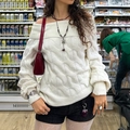 Chic off-the-shoulder cable knit sweater in white, styled with a trendy red handbag - S / White