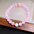 Pulsera de cuentas de piedra natural rosa con detalles dorados y cuenta azul clara - Larimar y Kunzita (Con Caja de Regalo)