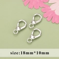 Three 18mm silver plated heart lobster clasps for jewelry making on green background - Geometric Clasp 18mm*10mm