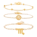 Three-piece gold Scorpio bracelet set featuring beaded and link chains with zodiac charms - Scorpio