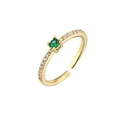 Detail of adjustable gold ring with a round green center stone and white zircon pavé - Adjustable Open / Gold Green Zirconia