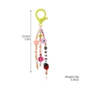 Porte-clés en perles colorées avec smiley jaune, œil maléfique et pendentif étoile - K2308-1BYE