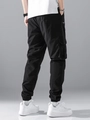 Pantaloni cargo neri da uomo con tasche multiple e polsini elastici vista posteriore - S / Nero