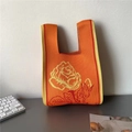 Orange knit tote bag with yellow and red rose patterns and thick cotton texture - Orange Rose