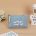 Blue striped canvas makeup bag with handle featuring white but first, make-up text - Dotted Letters / Light Blue