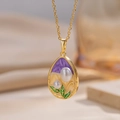 Vintage Franse ketting met witte parels en gouden bloemenhanger voor vrouwen - Paars