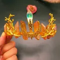Detail view of handmade golden branch tiara featuring raw crystals and crescent moon - Milk Tea Crystal + Gold Wings Moon Flat Style