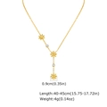 Golden stainless steel Y-shaped necklace featuring three daisy charms and clear zircons - Gold