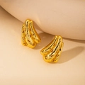 Irregular hollow gold earrings with polished finish and subtle textured dots on metal - Hollow Claw Stud Earrings