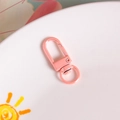 Pink metal lobster clasp for DIY crafts with 360-degree rotating ring and spring hook - Light Pink Iridescent