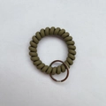 Olive green spiral coil keychain bracelet with flexible wristband and silver metal ring - Grass Green