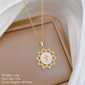 Detailed close-up of golden star cross pendant with mother of pearl and tiny diamonds - Cross Round Mother Of Pearl Pendant (G442)