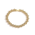 Detail view of gold butterfly bracelet with black micro-pave crystals on white backdrop - Gold Plated Black Zircon Bracelet