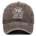 Detail of 70th birthday embroidery on vintage washed cotton baseball cap with slogan - 70th Birthday / Coffee