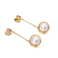 Golden heart earrings with long chains and round white pearls on a clean white backdrop - Heart Gold (KE85778-KFC)