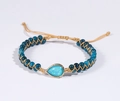 Handmade woven bead bracelet with deep blue stones and a light blue teardrop charm - Waterdrop Blue