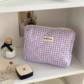 Purple quilted makeup bag with pink bow pattern and top zipper closure - Clutch Bag / Purple
