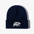 Detailed close-up of polar bear embroidery and Papa text on navy knit beanie hat - Navy Blue