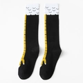 Calze nere sopra il ginocchio con divertente motivo a zampa di gallina gialla su bianco - Calze al polpaccio / Confezione standard / Nero Giallo