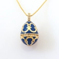 Detail of egg-shaped enamel pendant with gold filigree and pavé cubic zirconia - Blue