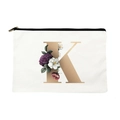 Canvas makeup bag featuring golden floral letter K print with black zipper closure - Letter K