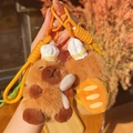 Plush Capybara keychains with chef hats, brown fur, and bread backpack accessories - Baker - Toast