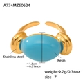 Detail view of 18k gold plated stainless steel ring with turquoise resin oval stone - US 7 / Gold Sky Blue Resin