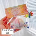 Rosa-blauer Durian Squishy mit Farbverlauf, bunten Streuseln und Verpackung - Farbenfrohe Durian