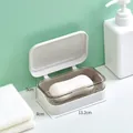 Portasapone bianco con coperchio ambra trasparente e sistema di drenaggio per il bagno - Bianco
