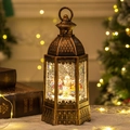 Bronze Christmas snow globe lantern with snowman scene and swirling glitter - New Hexagonal Snowman & Child
