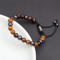 Adjustable tiger eye bead bracelet featuring a sliding knot and dark metallic accents - Tiger Eye Hematite Slider Style