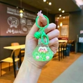 Close-up of a cute green translucent resin rabbit keychain with glitter and a small bell - Colorful Hardware Keychain Style / Luminous Bubble Beads Tata (Green)