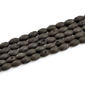 Macro shot of oval black lava rock beads with porous texture for DIY jewelry making - Drum Bead 8*12mm (16 Beads Length 200mm) / Electroplated Black