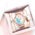 Close-up of women's gold quartz watch set with blue cat dial and matching bracelets - Watch + Bracelet + Box / Rose Gold