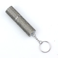 Macro detail of the sparkling rhinestones on the silver portable perfume bottle - Gray