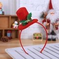 Red Christmas mini top hat headband with holly leaves and gold bell for festive parties - Top Hat with Green Leaves