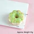 Green glazed artificial donut model with colorful sprinkles on a white display stand - Diameter 7cm, Height 3cm / Grass Green